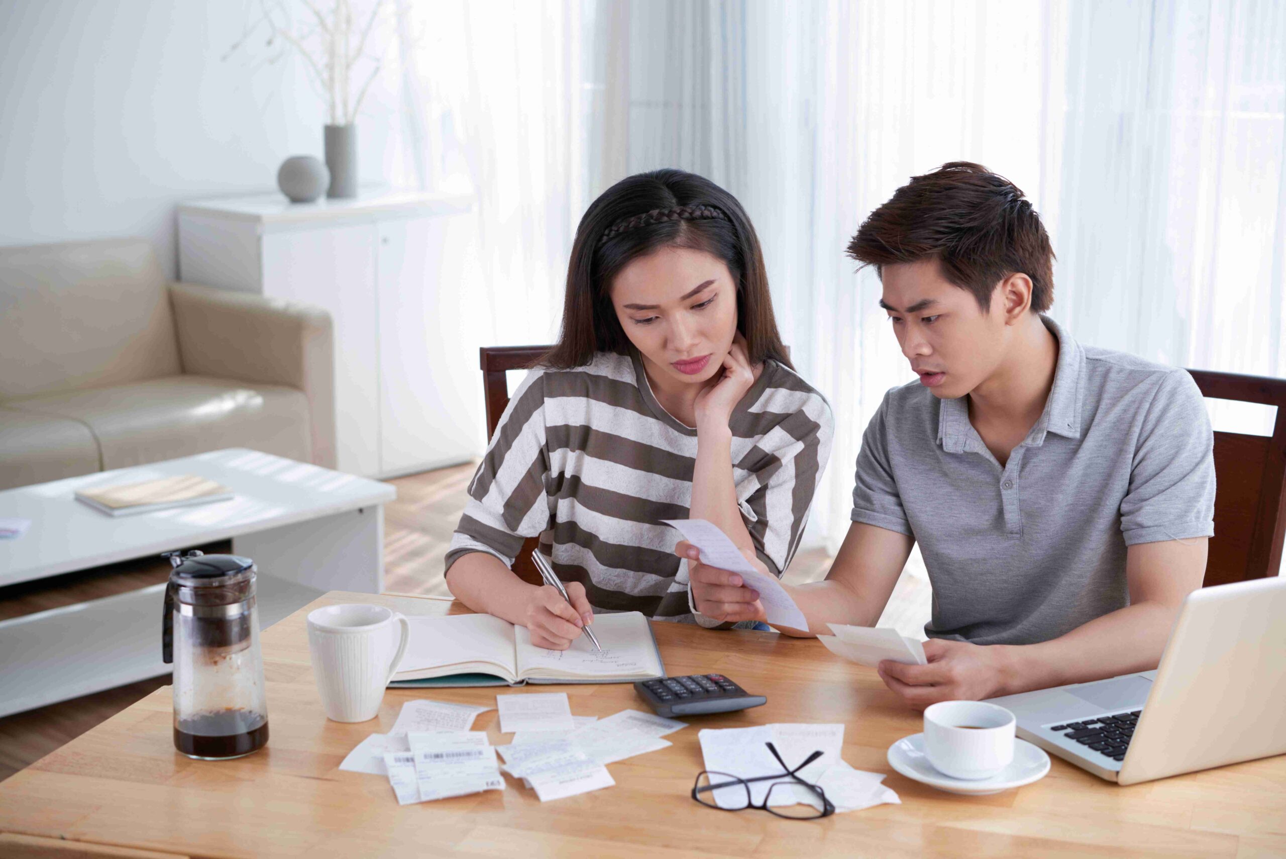 Young couple exploring their first time personal loan options